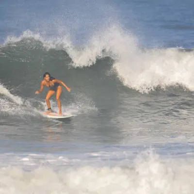 Alysha surfing